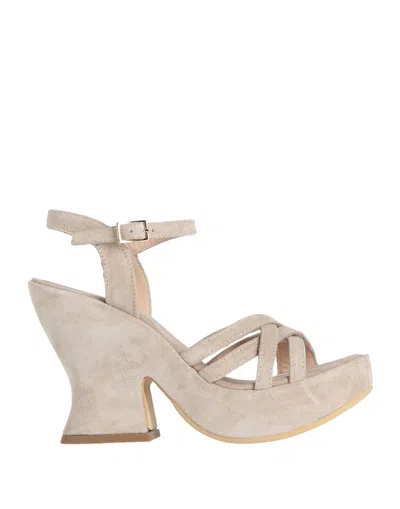 Divine Follie Sandals In Beige