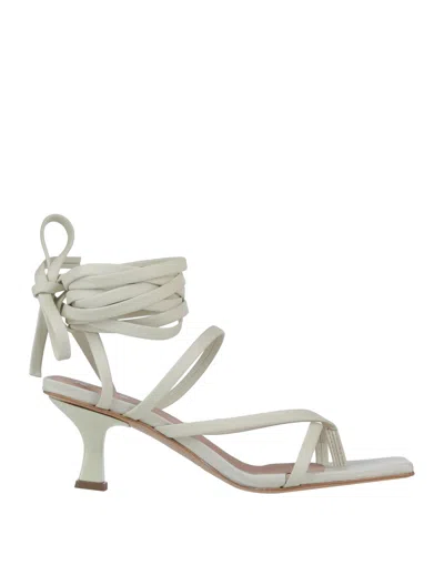 Divine Follie Toe Strap Sandals In White