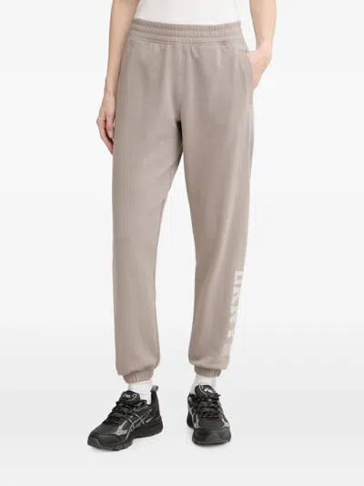 Dkny 1989 Stud-embellished Logo-print Track Pants In Neutral