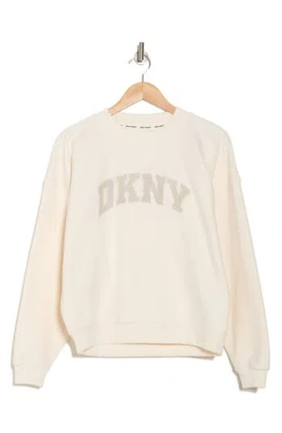Dkny Arched Distressed Rhinestone Pullover Sweatshirt In Eggnog/pebble