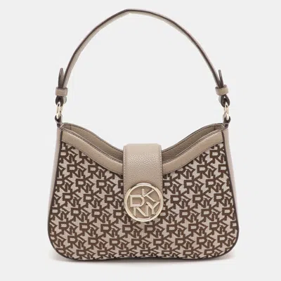 Pre-owned Dkny Beige Signature Canvas And Faux Leather Hobo In Sand