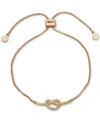 Dkny Gold-tone Pave Knot Accent Slider Bracelet In Crystal White