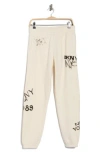 Dkny Graffiti Logo High Waist Relaxed Joggers In Neutral