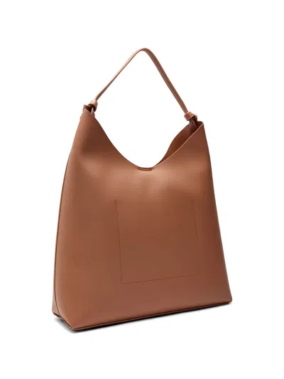 Dkny Logo-detail Shoulder Bag In Brown