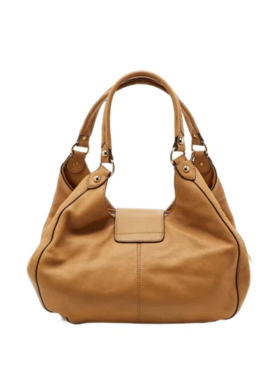 Pre-owned Dkny Logo-charm Leather Shoulder Bag In Brown