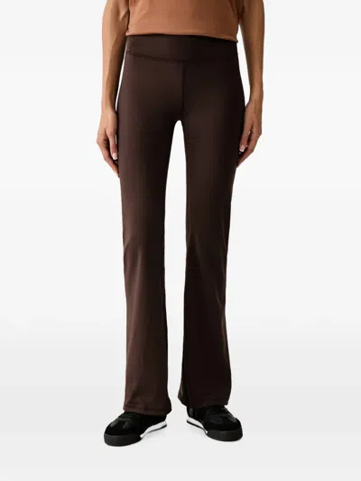 Dkny Logo-print Flared Trousers In Brown