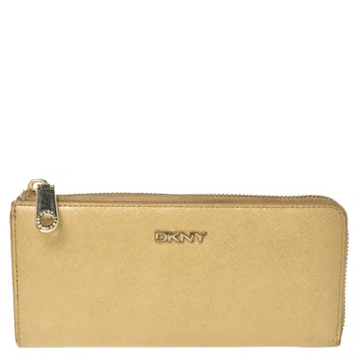 Dkny Metallic Beige Leather Zip Around Wallet In Brown