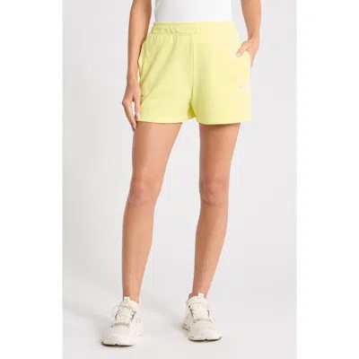 Dkny Metallic Logo High Rise French Terry Shorts In Yellow