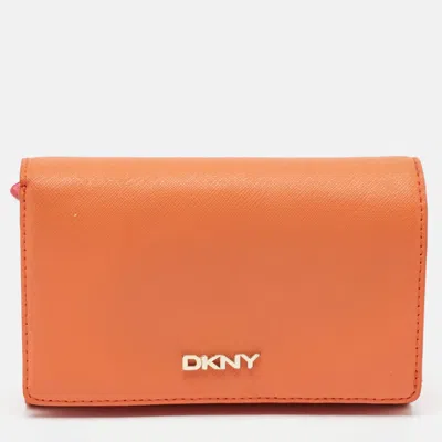 Dkny Orang/pink Leather French Flap Wallet In Orange