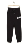Dkny Rhinestone Arched Logo Joggers In Black/eggnog