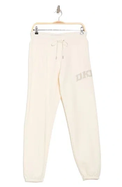 Dkny Rhinestone Arched Logo Joggers In Eggnog/pebble