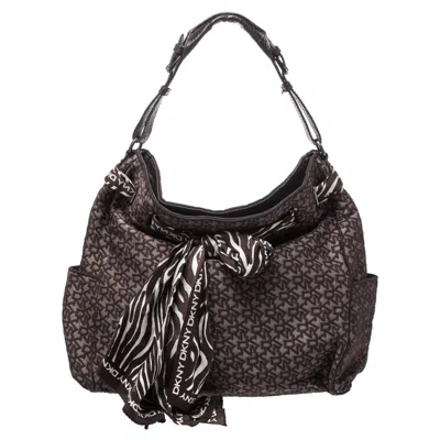 Dkny Signature Canvas Scarf Hobo In Brown