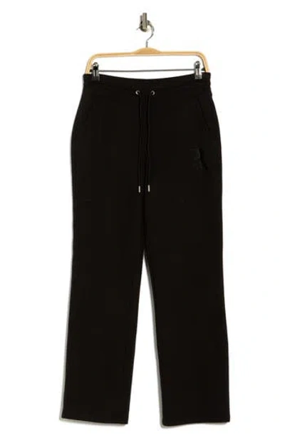 Dkny Stacked Logo Bootcut Sweatpants In Black