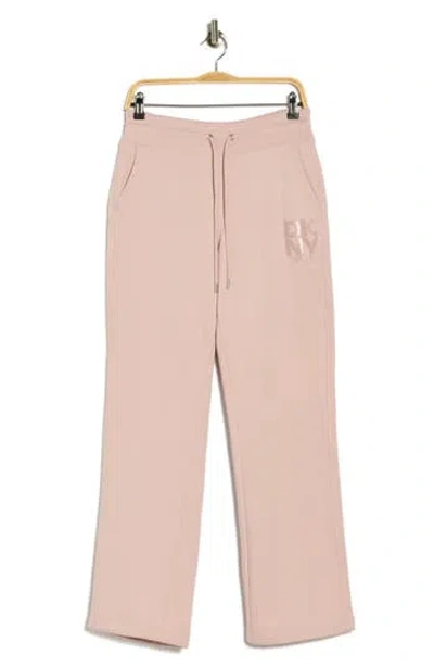 Dkny Stacked Logo Bootcut Sweatpants In Pink