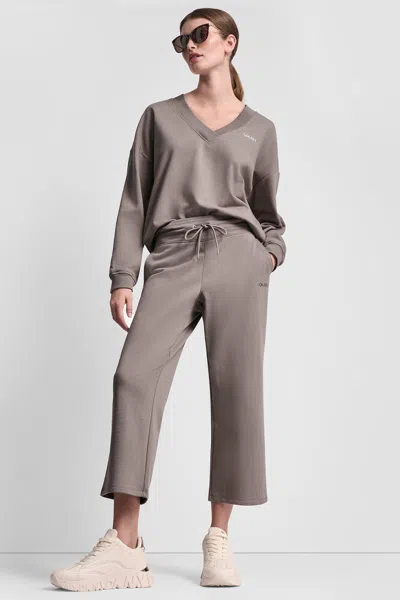 Dkny Women's Metalltic Bubble Logo Cropped High-rise Pants In Brown