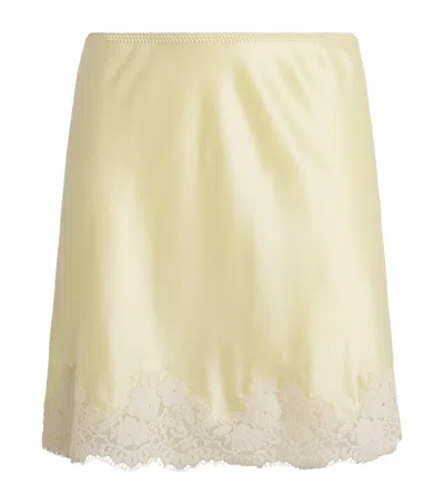 Doen Giulietta Lace-trimmed Silk-charmeuse Mini Skirt In Yellow