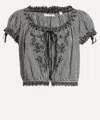 Doen Dôen Nera Tie Neck Puff Sleeve Crop Top In Black