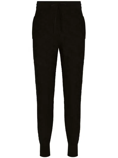 Dolce & Gabbana All-over Logo Track Pants In Black