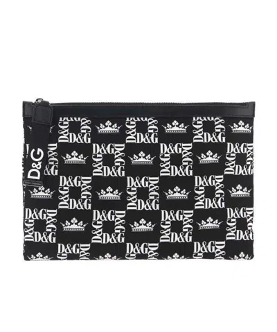 Dolce & Gabbana Dolce  Gabbana All-over Logo Printed Zipped Pouch In Black