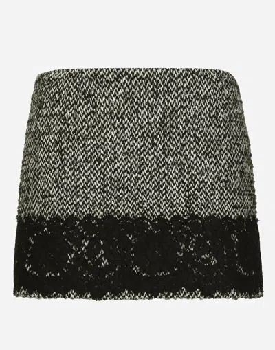 DOLCE & GABBANA SHORT MICRO-TWEED SKIRT WITH LACE INSERT