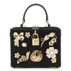 Dolce & Gabbana Patterned Shoulder Bag In Black