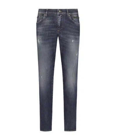 DOLCE & GABBANA DOLCE  GABBANA MID-RISE RIPPED DENIM JEANS