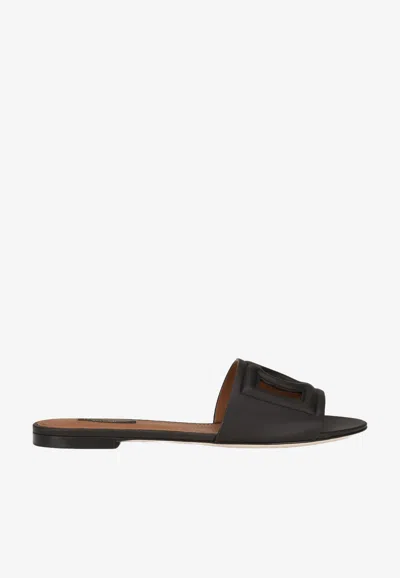 Dolce & Gabbana Bianca Logo-embossed Cutout Leather Slides In Black