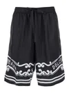 Dolce & Gabbana Black Bermuda Pants With Drawstring Elastic Waist And Maxi Print In Black