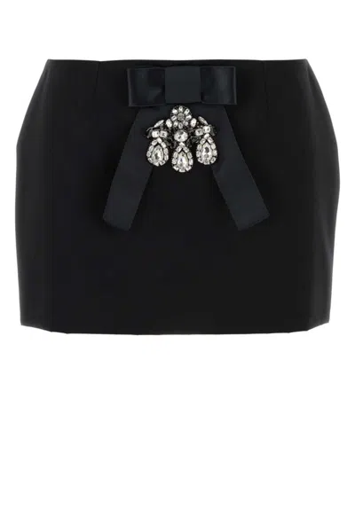 DOLCE & GABBANA WOMEN BLACK BOW-EMBELLISHED SATIN MINI SKIRT, 28 LUXURY SKIRTS FOR WOMEN DARVEYS