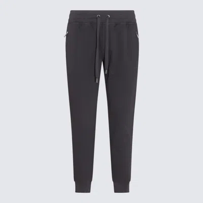 DOLCE & GABBANA BLACK TRACK PANTS WITH LOGO APPLIED ON THE BACK IN COTTON MAN