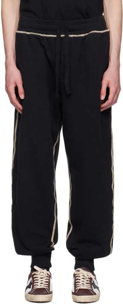 Dolce & Gabbana Black Heraldic Dg Logo Sweatpants In N0000 Nero