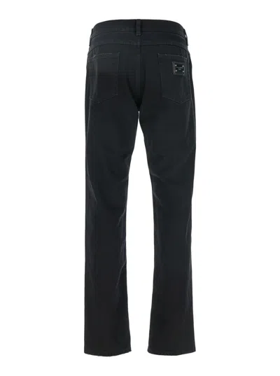 Dolce & Gabbana Black High Waist Jeans With Ripped Details And Logo Patch On The Rear In Denim Man In Blue