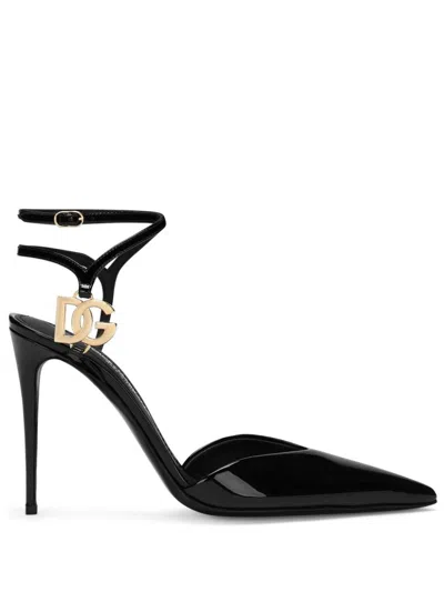 DOLCE & GABBANA BLACK PATENT LEATHER POINTED TOE PUMPS WITH ANKLE STRAP AND GOLD-TONE LOGO PLAQUE