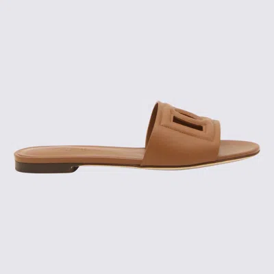 Dolce & Gabbana Slide Sandals With Cut Out Logo In Leather Woman In Brown