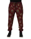 Dolce & Gabbana Burgundy Peacock Feather Print Jogger Pants In Brown