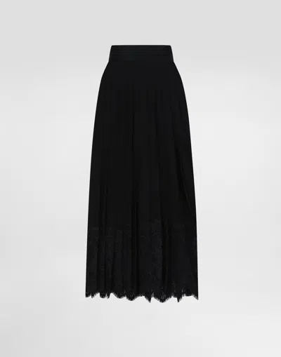 DOLCE & GABBANA CALF-LENGTH CIRCLE SKIRT IN PLEATED GEORGETTE WITH LACE TRIMS
