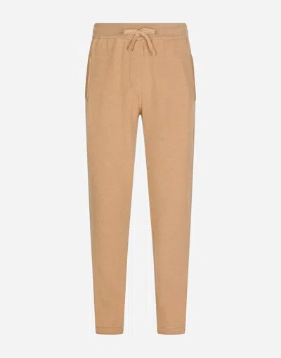Dolce & Gabbana Cashmere Jogging Pants With Dg Logo In Beige
