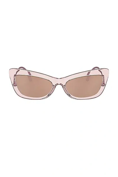 Dolce & Gabbana Cat Eye Sunglasses In Transparent Pink