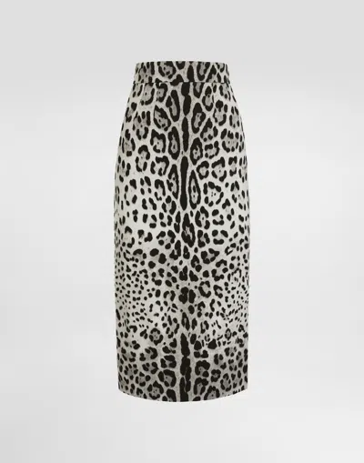 DOLCE & GABBANA CHARMEUSE CALF-LENGTH PENCIL SKIRT WITH LEOPARD PRINT