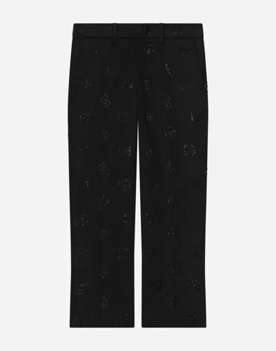 Dolce & Gabbana Classic Wool Pants With All-over Fusible-rhinestone Logo In Black