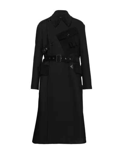 Dolce & Gabbana Coats In Black