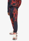 Dolce & Gabbana Coral-print Cotton Track Pants In Navy
