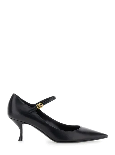 DOLCE & GABBANA BLACK SLINGBACK PUMPS WITH MEDIUM STILETTO HEEL AND LATERAL LOGO PLAQUE IN PATENT LEATHER WOMAN