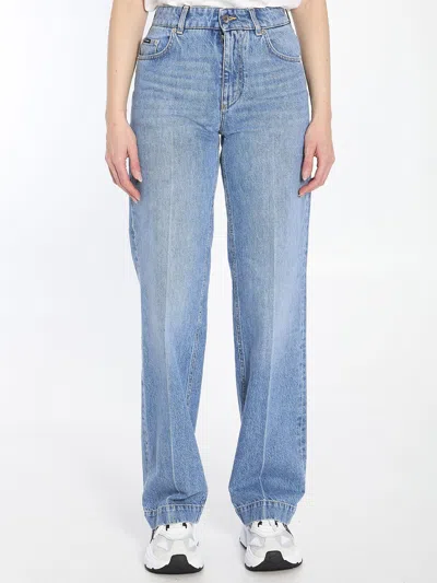 Dolce & Gabbana Blue Five Pocket Jeans With Metallic Logo Patch On The Back In Denim Woman