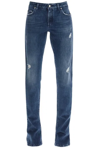 Dolce & Gabbana Destroyed Skinny Jeans With Engraved Metal Accents In Blue