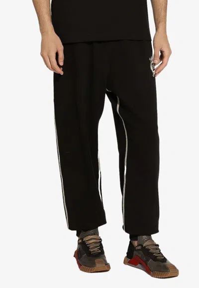 Dolce & Gabbana Dg Logo Print Track Pants In Black
