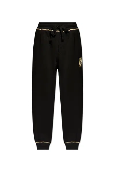 Dolce & Gabbana Jogging Pants With Heraldic Dg Logo In Black