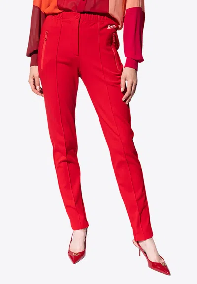 Dolce & Gabbana Dg Logo Tapered Pants In Red