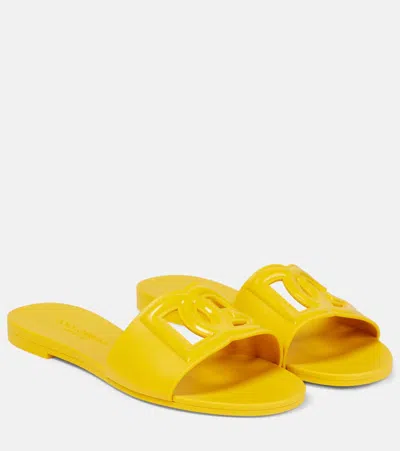 Dolce & Gabbana Cutout Rubber Slides In Yellow