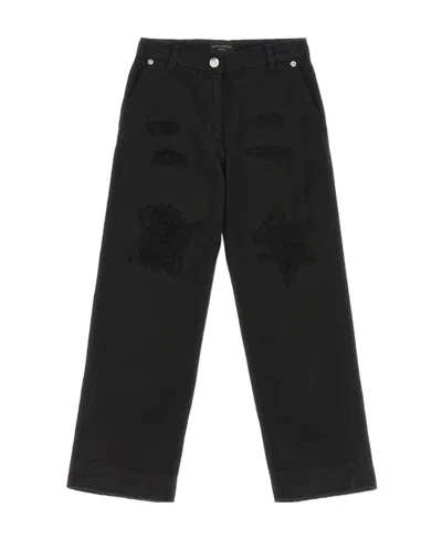 Dolce & Gabbana Distressed Slim-cut Jeans In Black